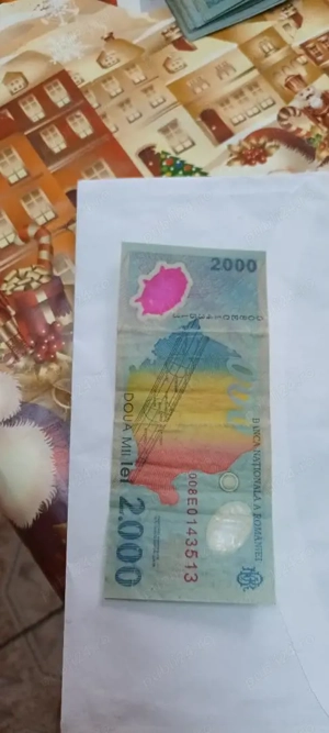 Vând bancnote de 2000 lei cu eclipsa totală de soare din 1999.