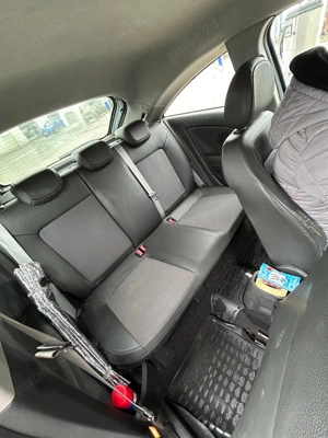 Opel Corsa 1.4 90cp - imagine 9