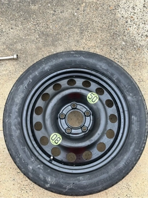 Vand roata de rezerva slim BMW.