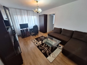 350 euro.Apartament cu 2 camere Et 1 cu centrala proprie Zona Dacia
