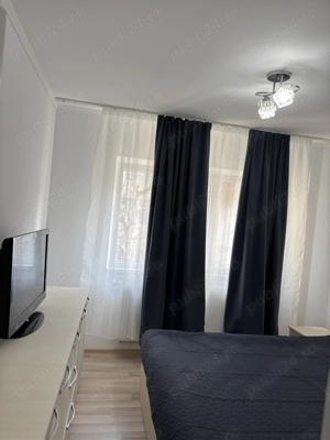 Închiriez apartament 2 camere - imagine 5