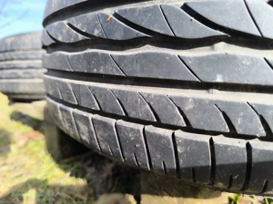 Set 4 roti aliaj 195/65/R15 Volkswagen 5x112 gume de vara Bridgestone