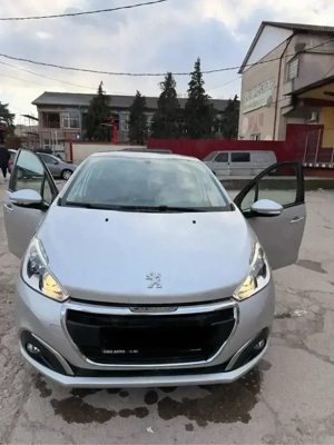 vand peugeot 208  benzina 