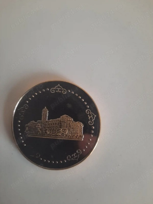 moneda placata cu aur