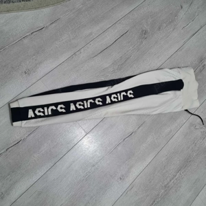 Pantaloni sport Asics femei