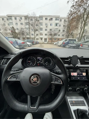 Skoda Octavia 1.6 TDI 110cp - imagine 9