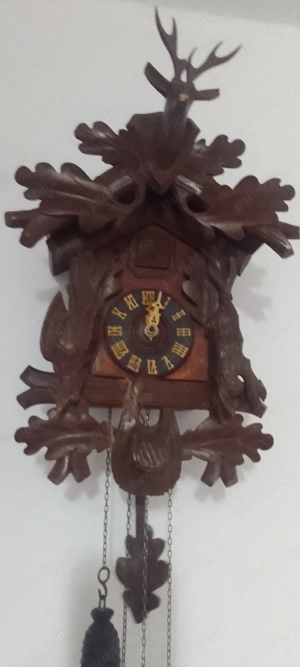 Ceas cu pendulă și cuc