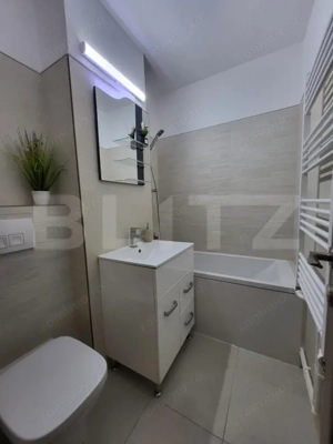 APARTAMENT CU 1 CAMERA FOARTE GENEROS-POZITIE EXCELENTA  - imagine 16