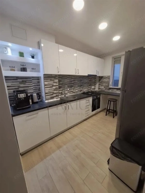 Complexul Studentesc - 2 Camere - Amenajat - Lift - Decomandat - Centrala termica proprie - Vedere p