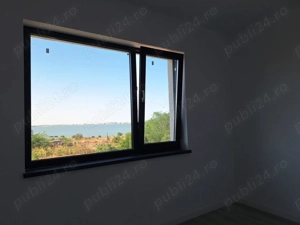 Va oferim in exclusivitate o vila deosebita conpusa din D+P+E+POD in suprafata utila de 130 mp utili - imagine 4