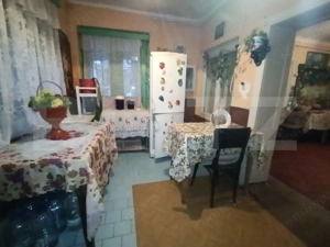 Casa cu 4 camere,baie, bucatarie,anexe.pivniță teren 1000 mp