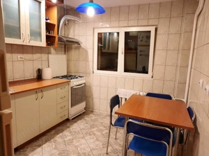 camera de inchiriat intr un apartment de 3 camere zona obor - imagine 2