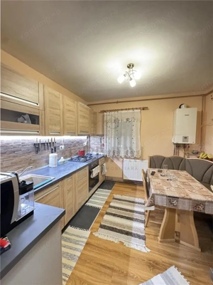 BUZIASULUI - ETAJ 1 - BLOC IZOLAT - 3 CAMERE - 2 BAI - 2 BALCOANE - CENTRALA PROPRIE - BOXA