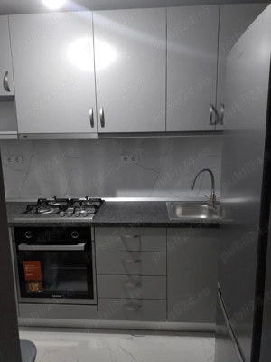 Apartamentul cu 1 cameră de închiriat - imagine 9