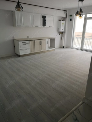 Apartament de 50 m în bloc nou-parter - imagine 2