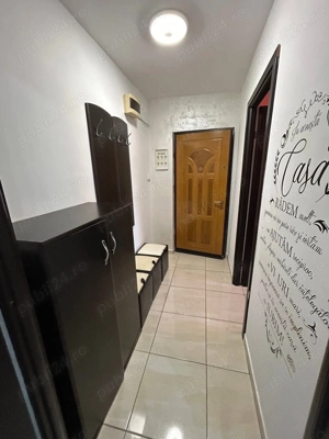 De inchiriat apartament cu 2 camere cu balcon, etaj 3, mobilat și utilat 1.250lei luna - imagine 8