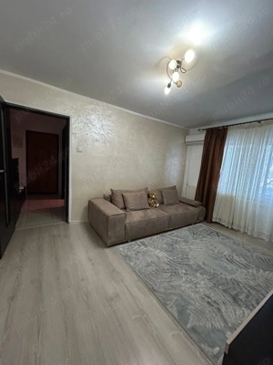 De inchiriat apartament cu 2 camere cu balcon, etaj 3, mobilat și utilat 1.250lei luna - imagine 6