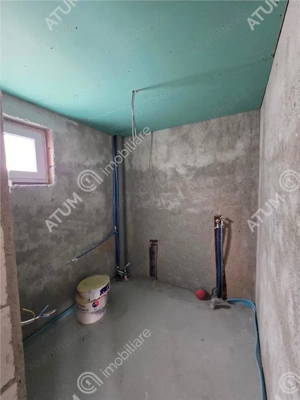 Casa cu 5 camere decomandate pe teren de 390 mp in Cisnadie Sibiu - imagine 9