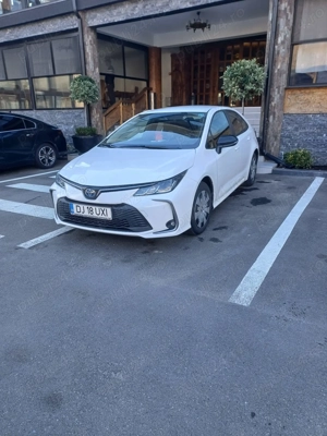 Toyota corolla 1,8 benzina -hybryd cumparata noua ,proprietar an 2025 