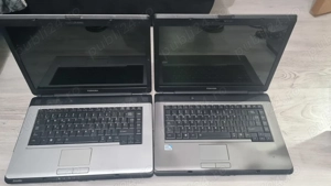 2 Laptop Toshiba L300 defecte, pentru piese.