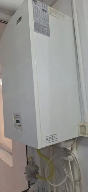 Vând apartament central, complet renovat cu centrală proprie - imagine 5