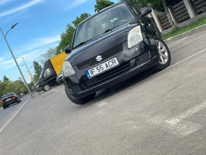Vand Suzuki Swift 1.3 Ddis - imagine 9
