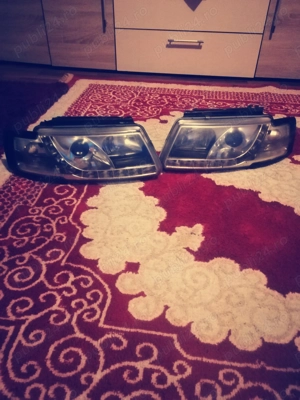 vând faruri de Passat b5 din 2000 cu Leduri ambele dacă sunteți interesați sunați la sau 0754479770  - imagine 5