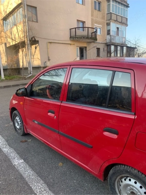 Daihatsu Cuore   economică, ideală oraș - imagine 2
