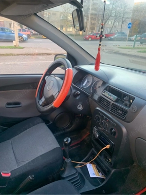 Daihatsu Cuore   economică, ideală oraș - imagine 3