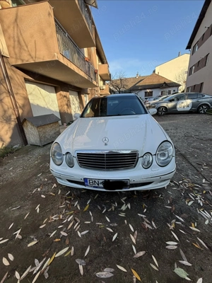 Vand  Mercedes E200 W211