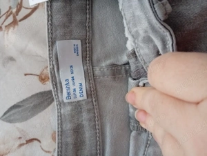 Blugi damă negri și albaștri .