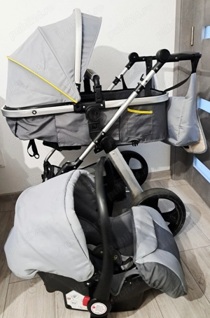 Vând cărucior 3 in 1 .