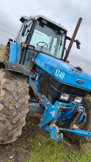 Tractor de vânzare new Holland  cu plug 