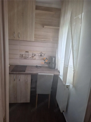 Garsoniera cu balcon etaj 1 zona Buziasului