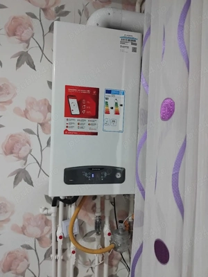 Garsonieră renovată,mobilata,zonă linistită,aproape de politie - imagine 7