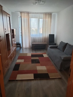 închiriez apartament cu 2 camere 