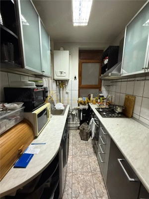 Apartament 2 camere etaj 1 zona Unirii centrala perfect pentru locuit sau investitie - imagine 11