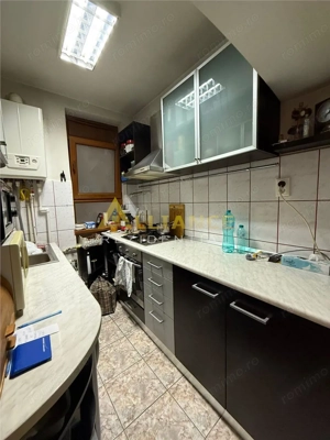 Apartament 2 camere etaj 1 zona Unirii centrala perfect pentru locuit sau investitie - imagine 12