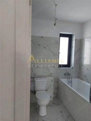 Casa la 4-5 km de metrou,bine amplasata,super pret . - imagine 2