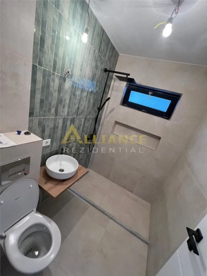 Casa individuala - 3 camere  - 2 bai - 100 mp utili-teren 215mp - imagine 14