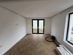 Casa individuala - 3 camere  - 2 bai - 100 mp utili-teren 215mp - imagine 13