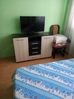 Camera  in  apartament  de  trei camere