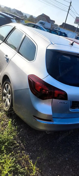 Dezmembrez / dezmembrari piese auto Opel ASTRA J Sports Tourer 1.4benz turbo  138727km culoare Z176  - imagine 4