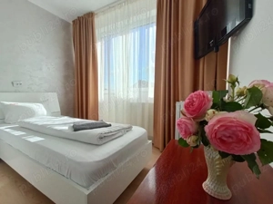 inchiriez camere cu 2,3,4 paturi pt muncitori,cu bucatarie si spalatorie,3stele,complet dotat si uti - imagine 3