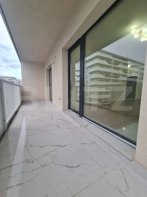 Apartament cu 2 camere, finisaje noi, terasa, parcare subterana, zona centrala