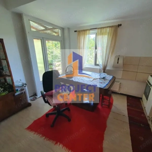 Vila deosebita cu o oaza de verdeata - imagine 17