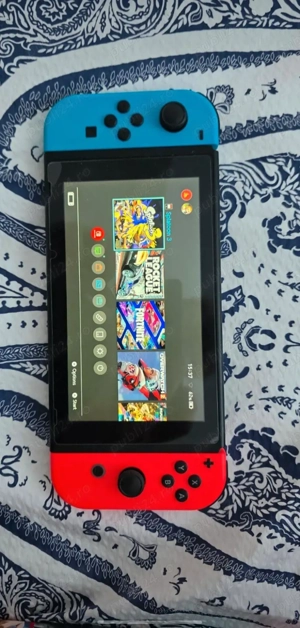 Vând Nintendo Switch cu micro sd card si 2 jocuri