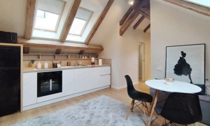Inchiriere Apartament  Mansarda – Centrul civic
