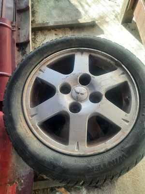 vând un set jante aliaj r15 demontate de pe un Mitsubishi 