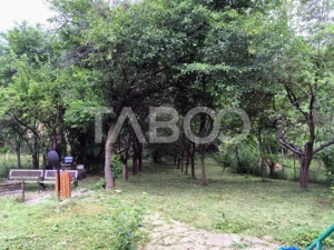 Casa de vacanta cu livada de 640 mp de vanzare in Tropinii Noi 